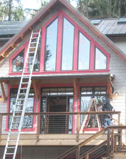 Front of the house with pink-primed trim